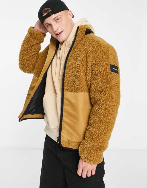 Calvin Klein – Brązowa zapinana na zamek kurtka z puszystego kożuszka z mieszanki poliestru 