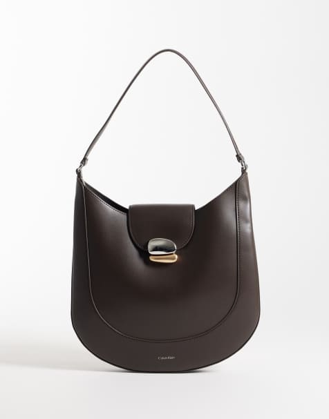 Calvin Klein bucket bag with two tone hardware in chocolate brown - view 1