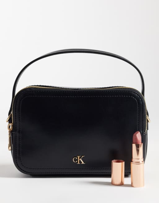 Calvin Klein camera bag with cross-body strap and gold details in black, 2 of 4