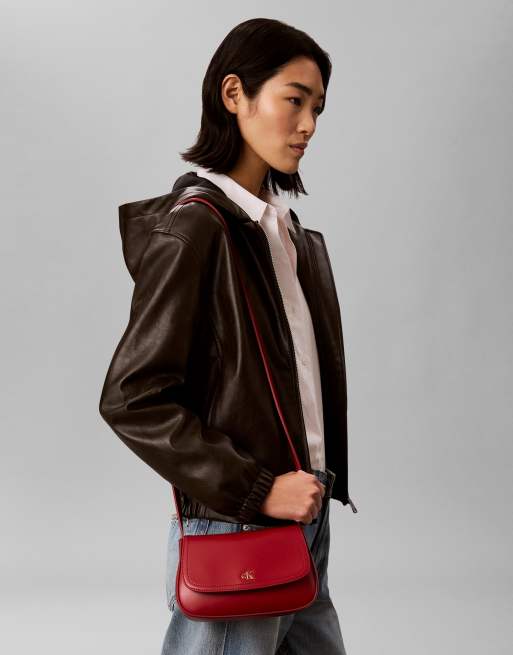 Calvin Klein camera bag with strap and gold detail in red, 5 of 5