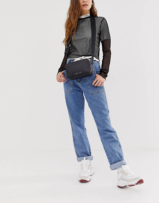 wide bag strap ASOS with camera print | Calvin Klein detail