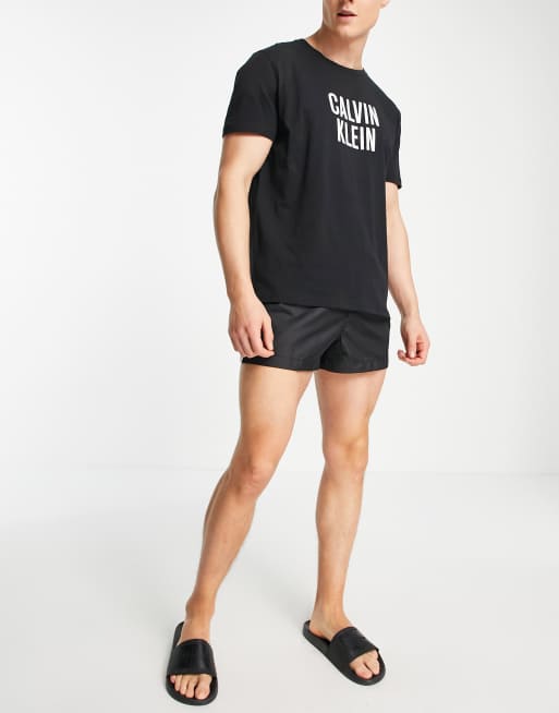 Calvin Klein chest logo relaxed fit swim t-shirt in black | ASOS