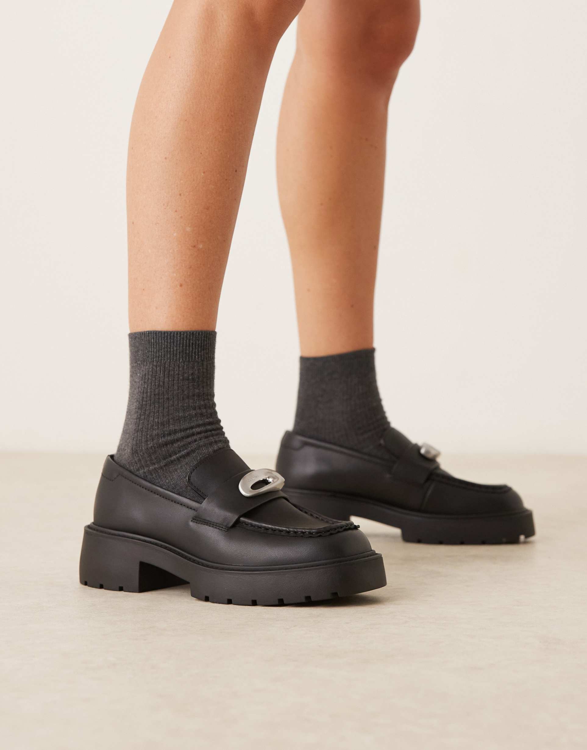 calvin klein chunky buckle loafers in black