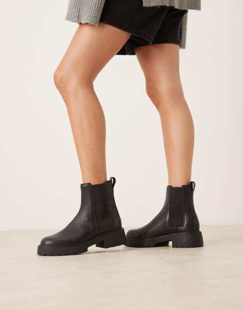 Calvin Klein chunky chelsea ankle boots in black - view 1