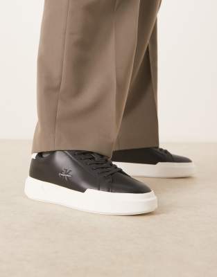  chunky cupsole lace up trainers with monogram logo in back and white