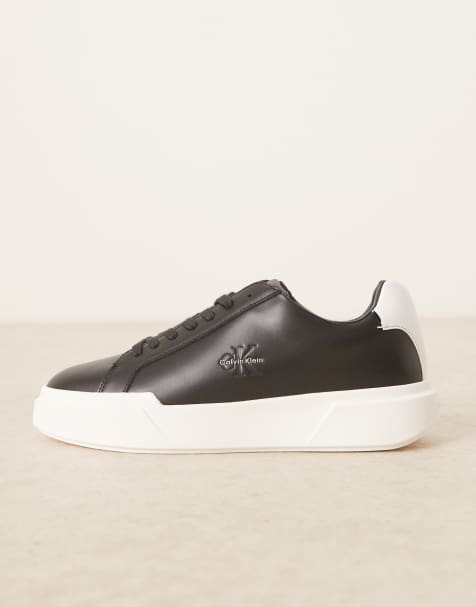 Calvin Klein chunky cupsole lace up trainers with monogram logo in back and white - view 2