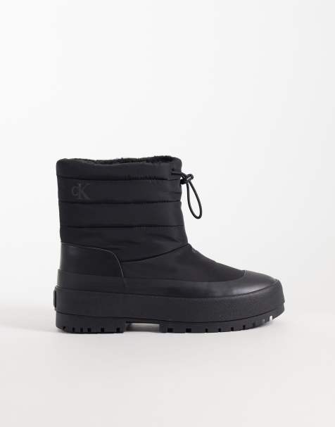 Calvin Klein chunky gewatteerde snowboot met plateauzool en toggle in zwart - view 1