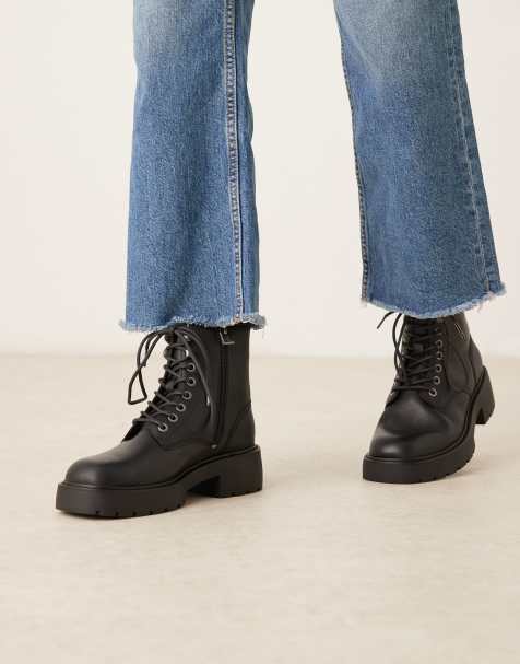 Calvin Klein chunky lace up boots in black - view 1