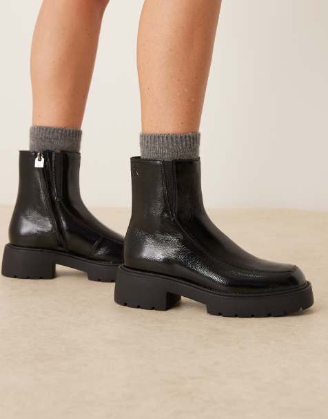 Calvin Klein chunky leather ankle boots with zipper in black - view 1