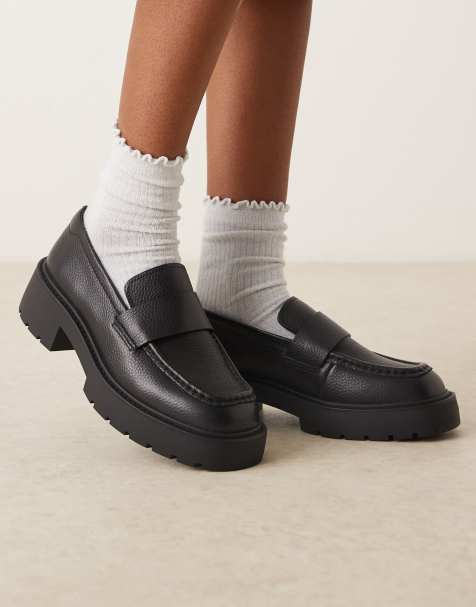 Calvin Klein chunky penny loafers in black - view 1