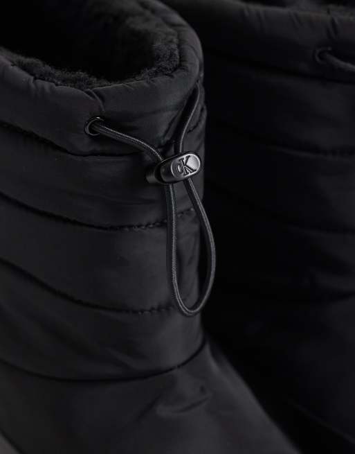 Calvin Klein chunky quilted flatform snow boot with toggle in black, 2 of 4