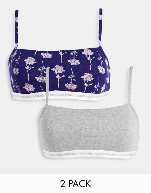 https://images.asos-media.com/products/calvin-klein-ck-one-cotton-2-pack-unlined-logo-bralettes-in-gray-and-blue-rose-print/200603619-1-greyandblue?$n_640w$&wid=513&fit=constrain