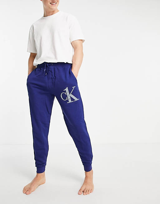 Calvin Klein CK One logo lounge joggers in blue | ASOS
