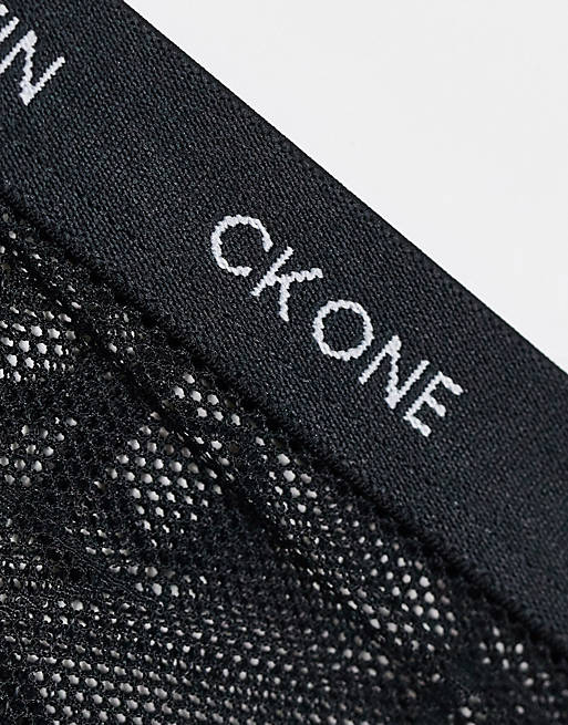 Calvin Klein CK One Plus logo mesh thong in black | ASOS