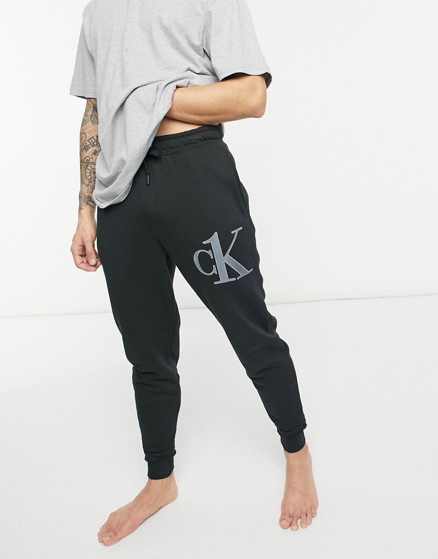 Calvin Klein CK One side logo sweatpants in black