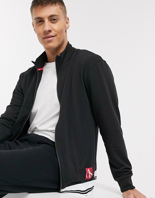 Calvin Klein CK One Sock zip thru lounge track jacket CO-ORD in black ...