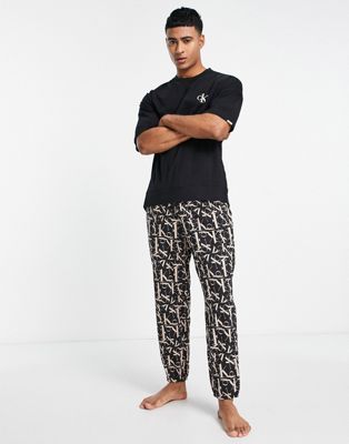 Calvin Klein CK1 all over print lounge joggers and t-shirt set in black