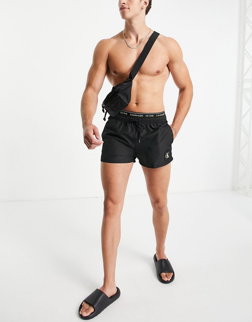 Calvin Klein CK1 swim shorts with double logo waistband in black