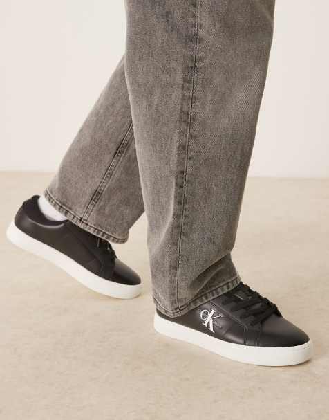 Calvin Klein classic cupsole leather sneakers in black and white - view 1