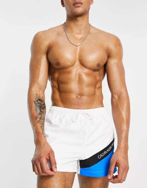 Calvin Klein colour block swim shorts in blue and white