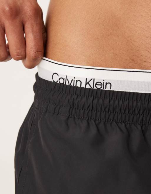 Calvin Klein contrast logo waistband drawstring swim shorts in black, 3 of 4