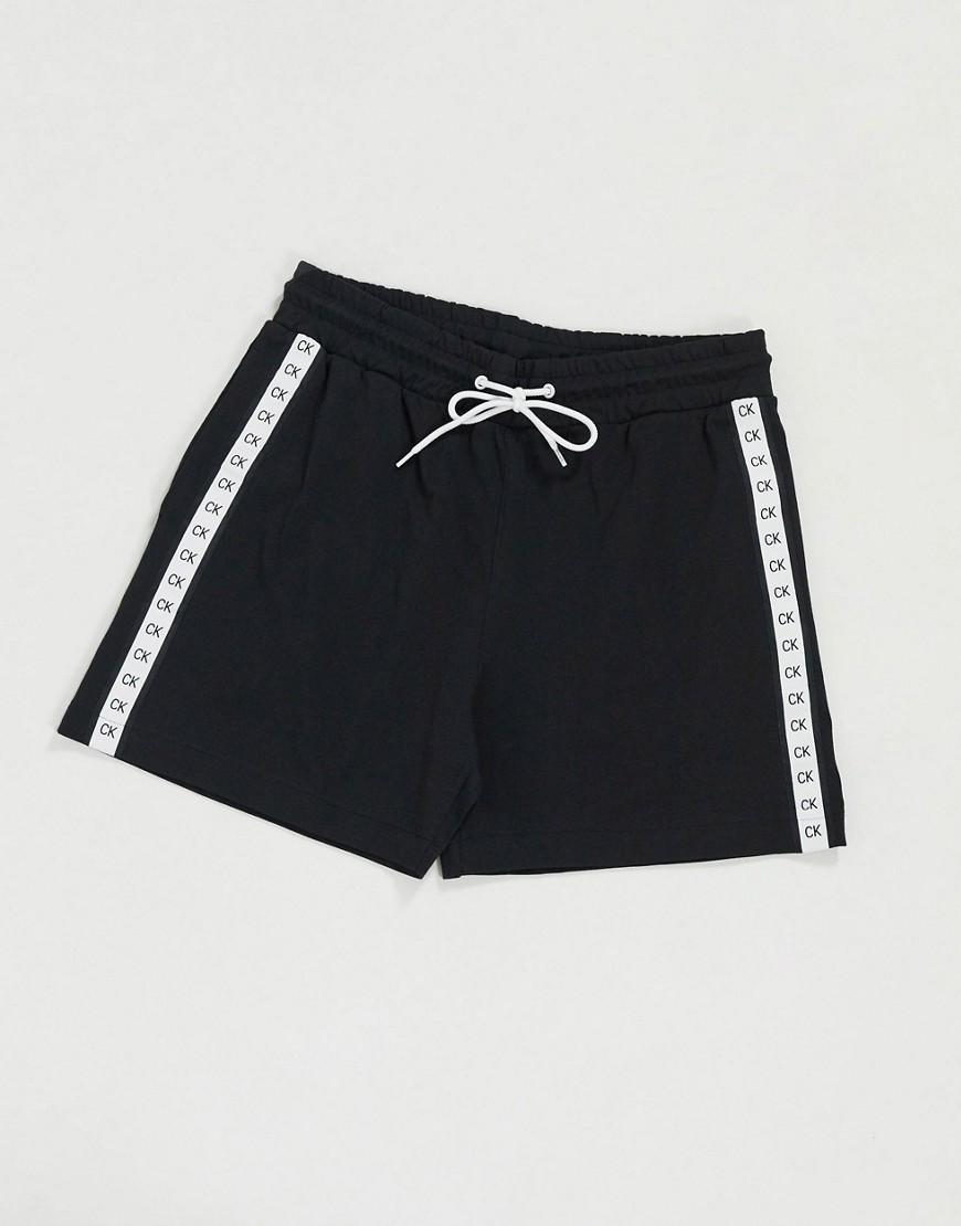 Calvin Klein Core Mono Tape logo beach shorts in black co-ord