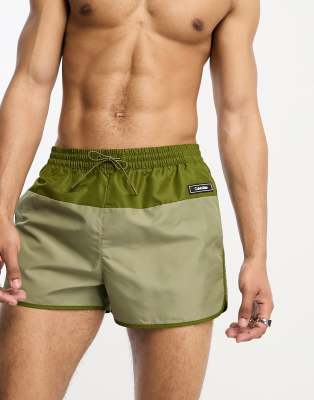 Calvin Klein core solids short runner swim shorts in delta green - ASOS Price Checker