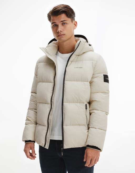 Calvin Klein crinkle nylon detatchable hood puffer jacket in stone | ASOS