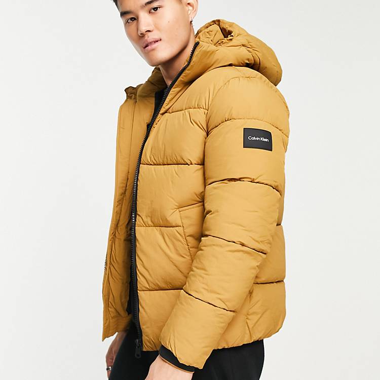 Calvin Klein crinkle nylon hooded puffer jacket in tan | ASOS