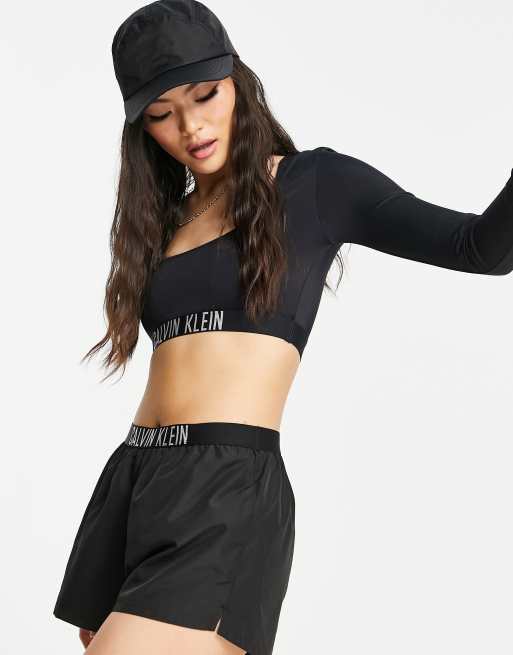 Contestar el teléfono raro Colapso Calvin Klein crop top in black | ASOS