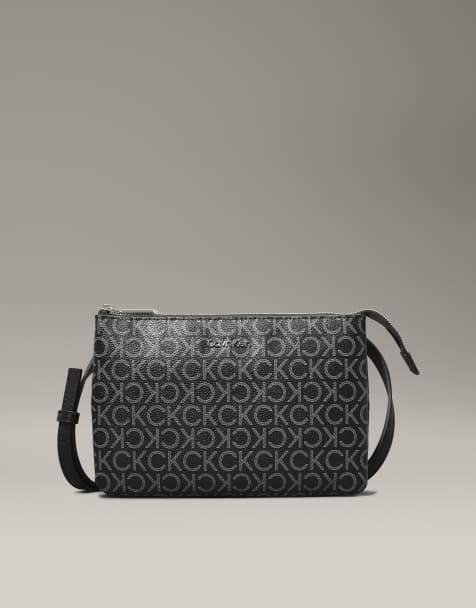 Calvin Klein cross body monogram logo bag in black/grey - view 1