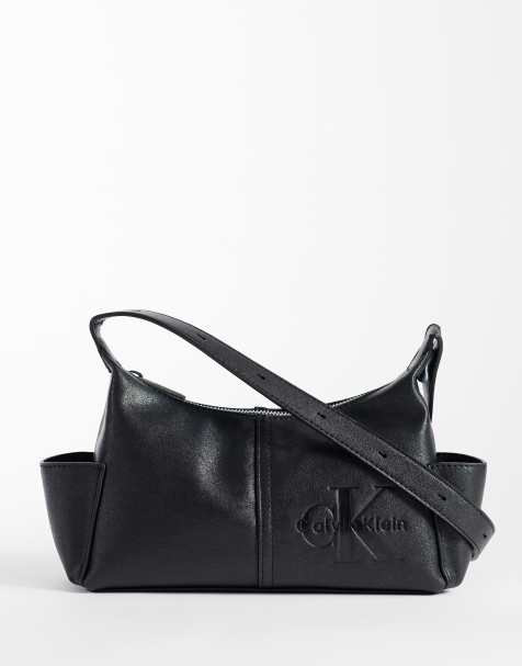 Calvin Klein – Czarna torebka crossbody z kieszeniami i logo z monogramem - view 1