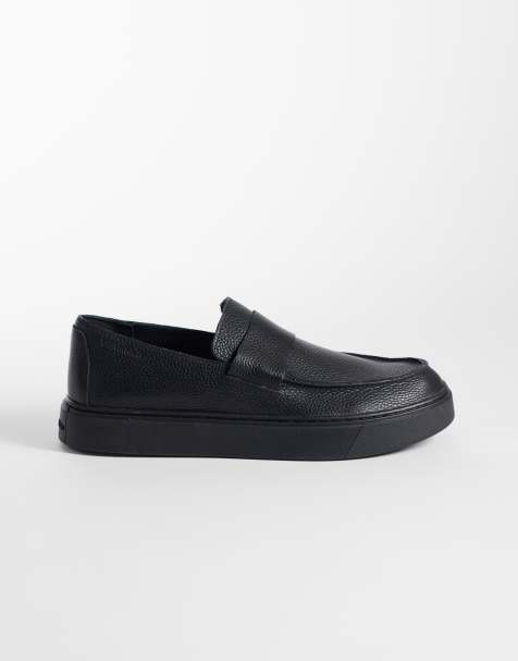 Calvin Klein – Czarne skórzane loafersy na masywnej podeszwie - view 1