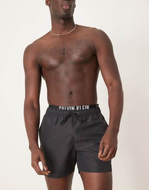 Calvin Klein – Czarne szorty kąpielowe z logo na taśmie w talii - view 1