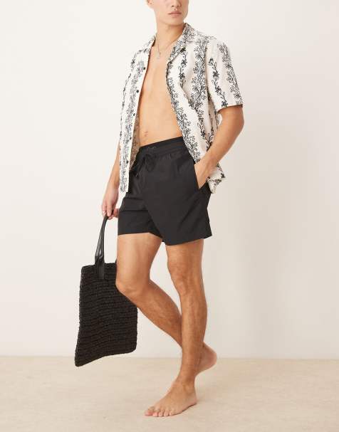 Calvin Klein Double waistband swim shorts - ck monogram in pvh black - view 1