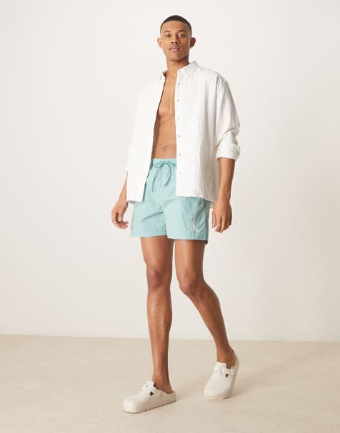 Calvin Klein drawstring logo swim shorts in aqua blue - view 1