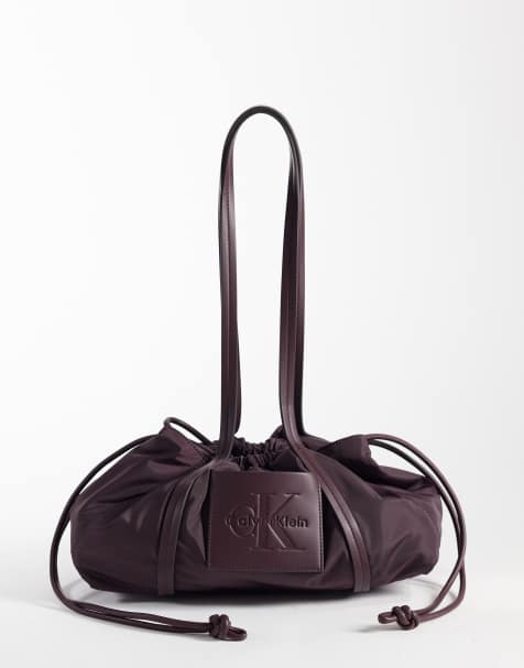 Calvin Klein drawstring satchel bag in fudge brown - view 1