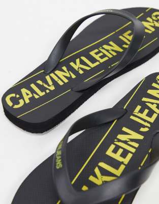 calvin klein black flip flops