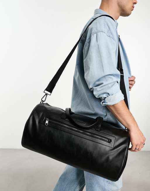 Calvin Klein elevated barrel bag in black ASOS