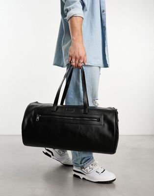 Calvin Klein elevated barrel bag in black - ASOS Price Checker