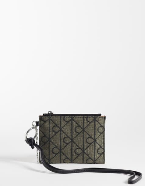 Calvin Klein emblem jacquard print wallet with metal hardware in black - view 1