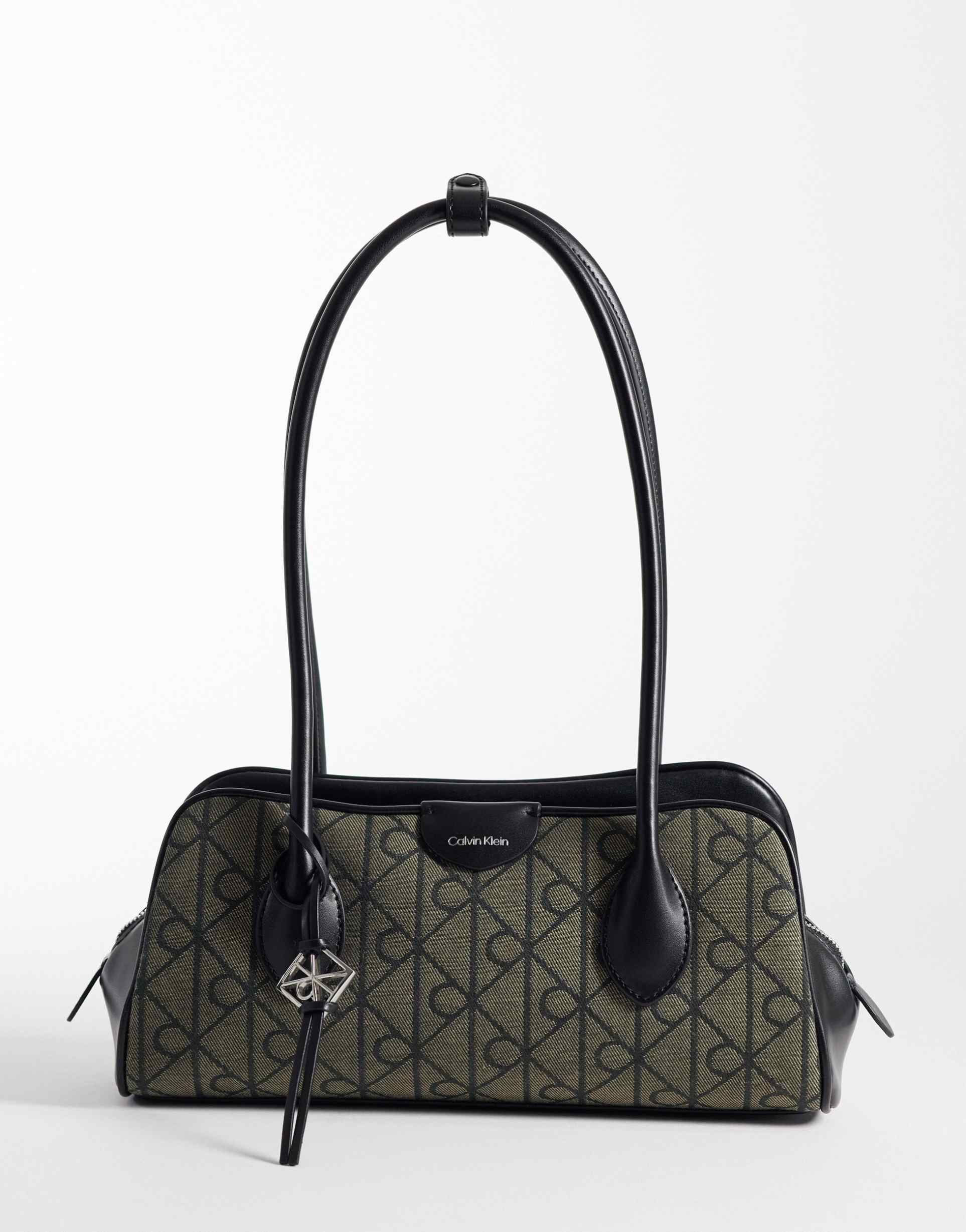 calvin klein emblem pebble shoulder bag in black