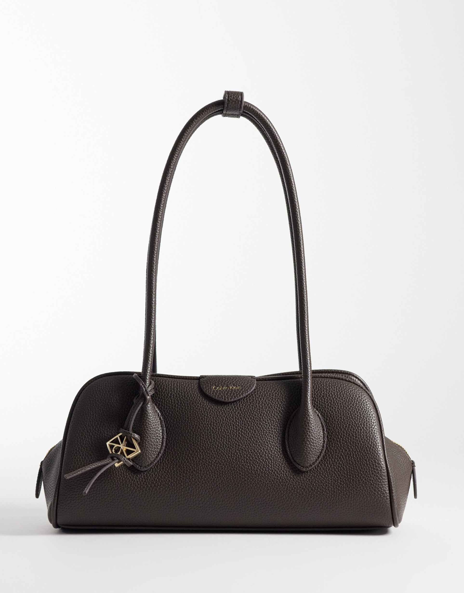 calvin klein emblem pebble shoulder bag in chocolate brown