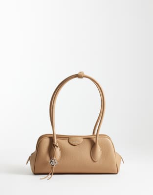 Calvin Klein Emblem Pebble Shoulder Bag In Brown