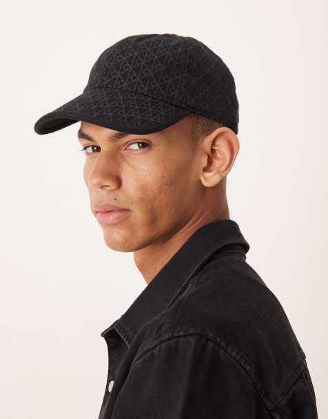 Calvin Klein emblem print cap in black - view 1
