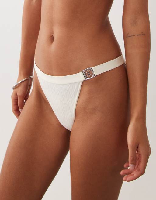 Calvin Klein embossed emblem bikini brief in ivory, 2 of 4