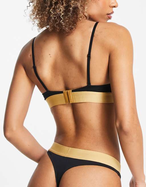 Calvin Klein Embossed Icon cotton blend lightly lined triangle bralette in  black and gold