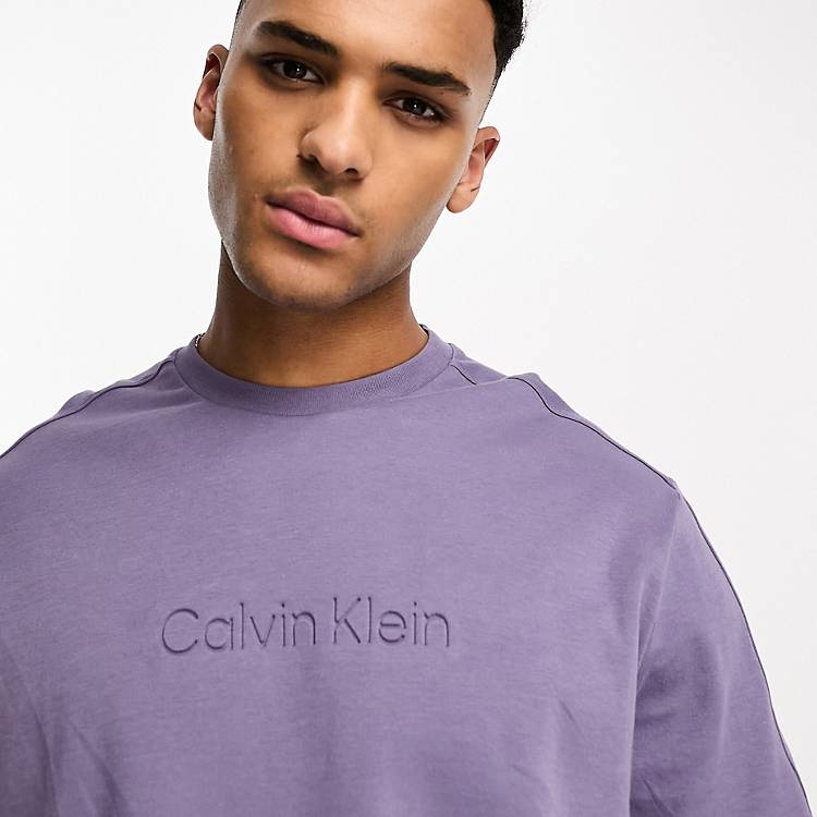 Calvin Klein embossed logo t-shirt in purple | ASOS