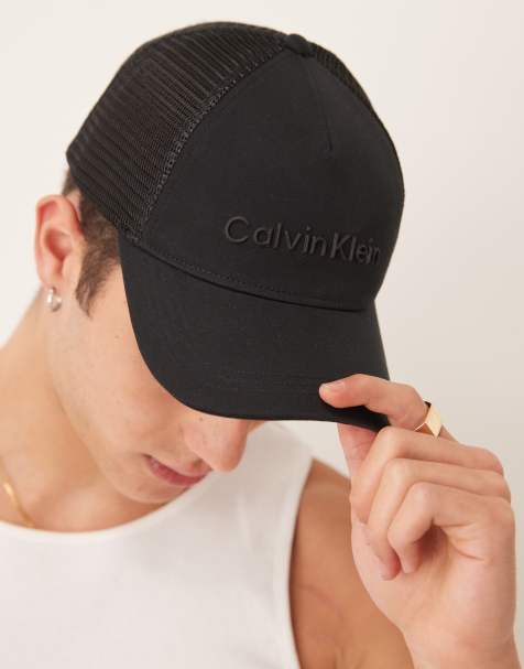 Calvin Klein embossed trucker cap in black - view 1