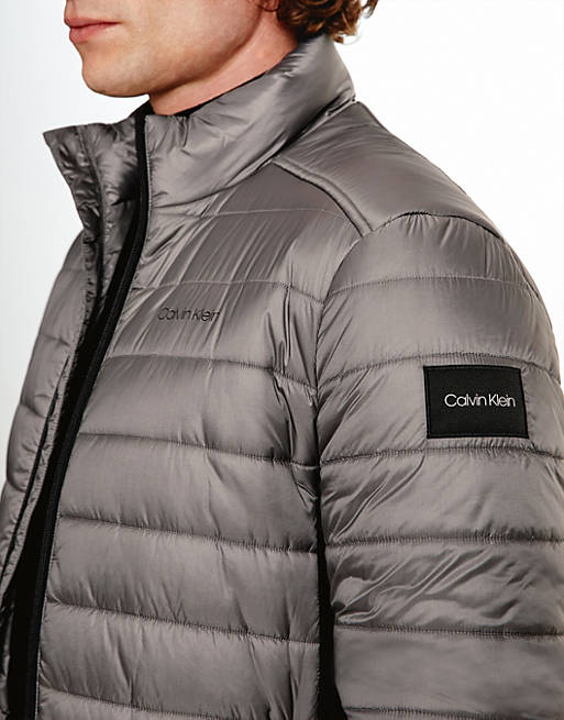 Calvin Klein essential side logo lightweight puffer jacket in gray | ASOS